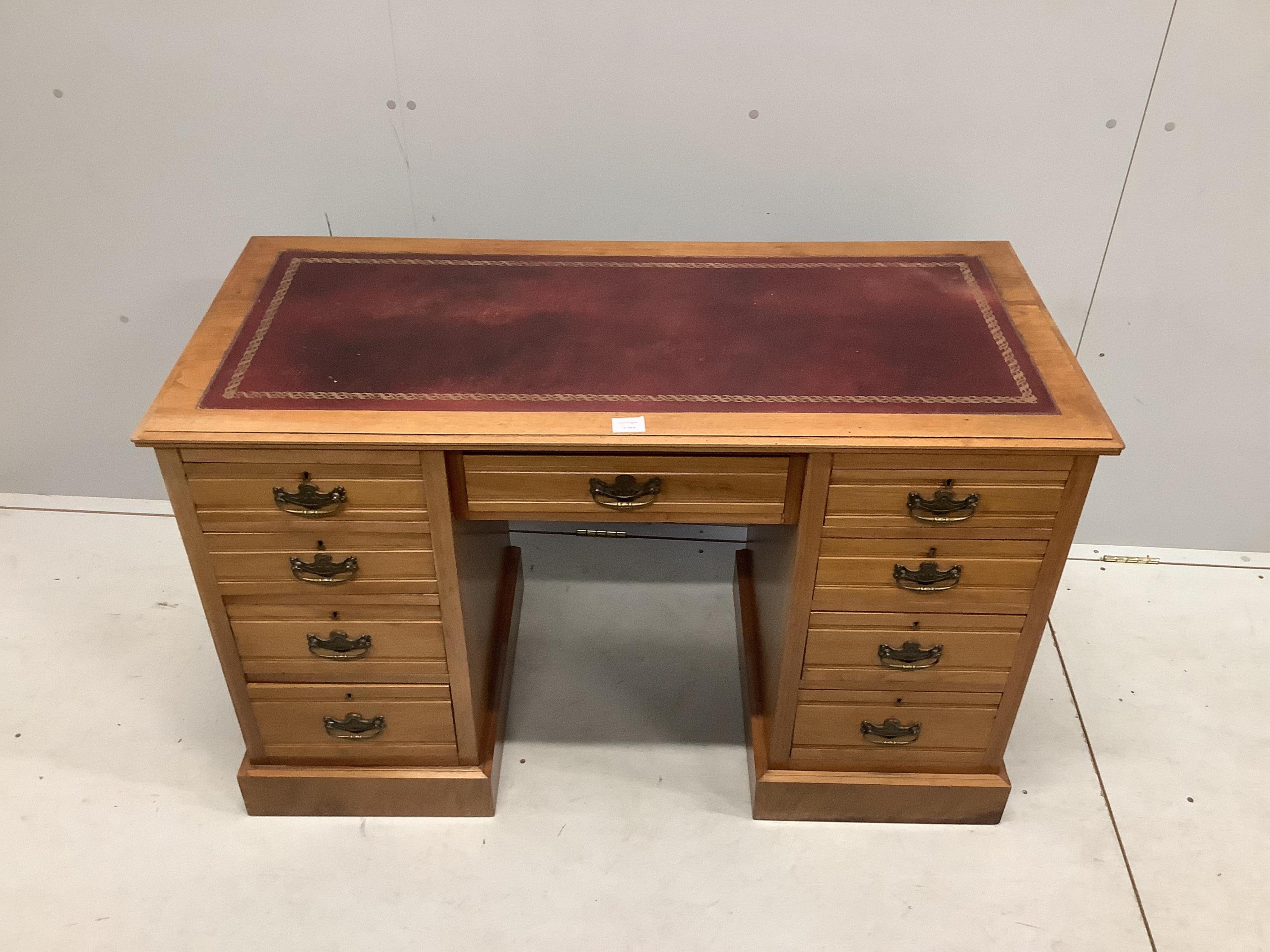 A late Victorian walnut kneehole desk, width 122cm, depth 56cm, height 75cm. Condition - good